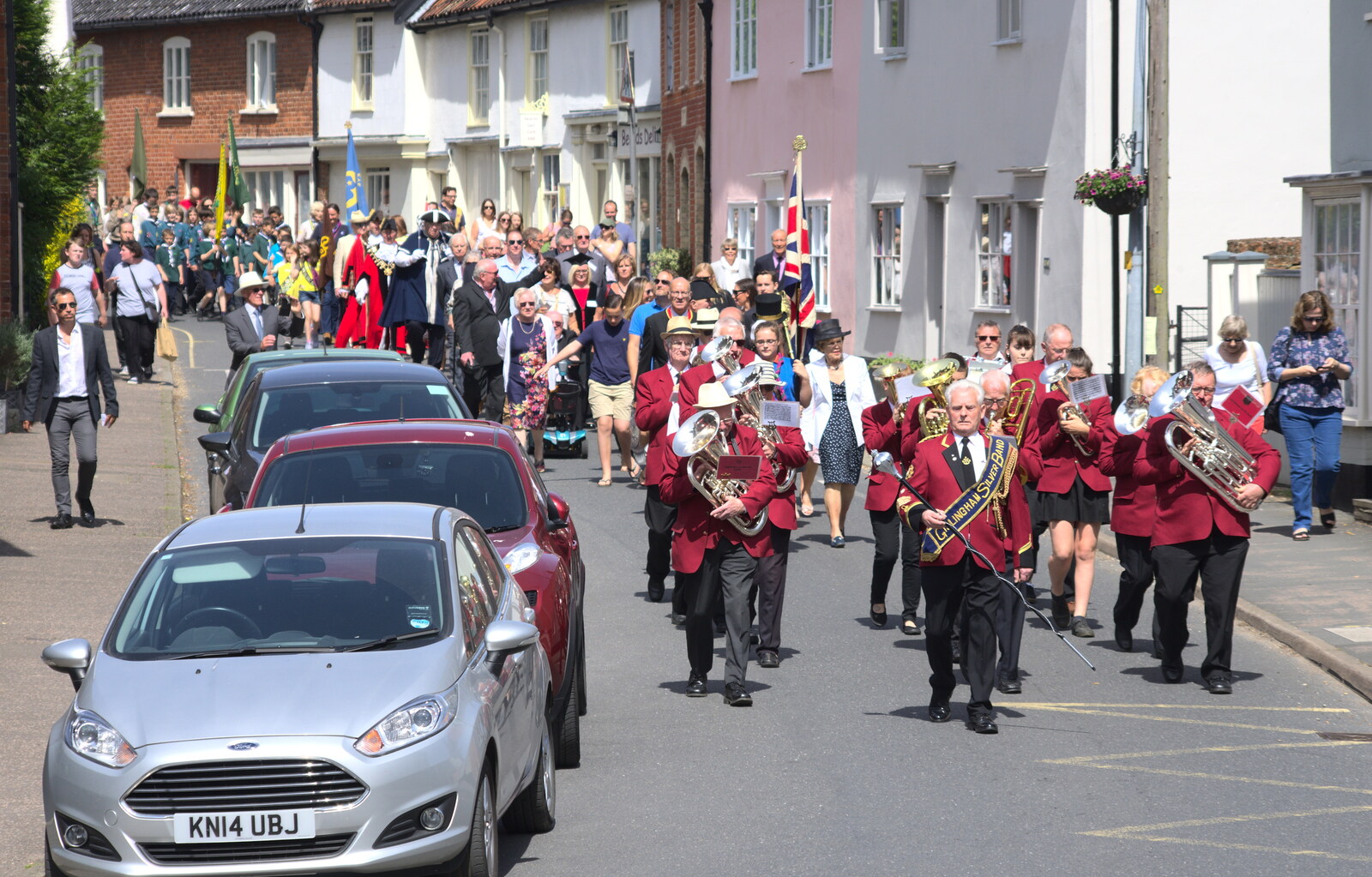 The parade marches up Church Street from The Mayor Making Parade, Eye, Suffolk - 24th June 2018