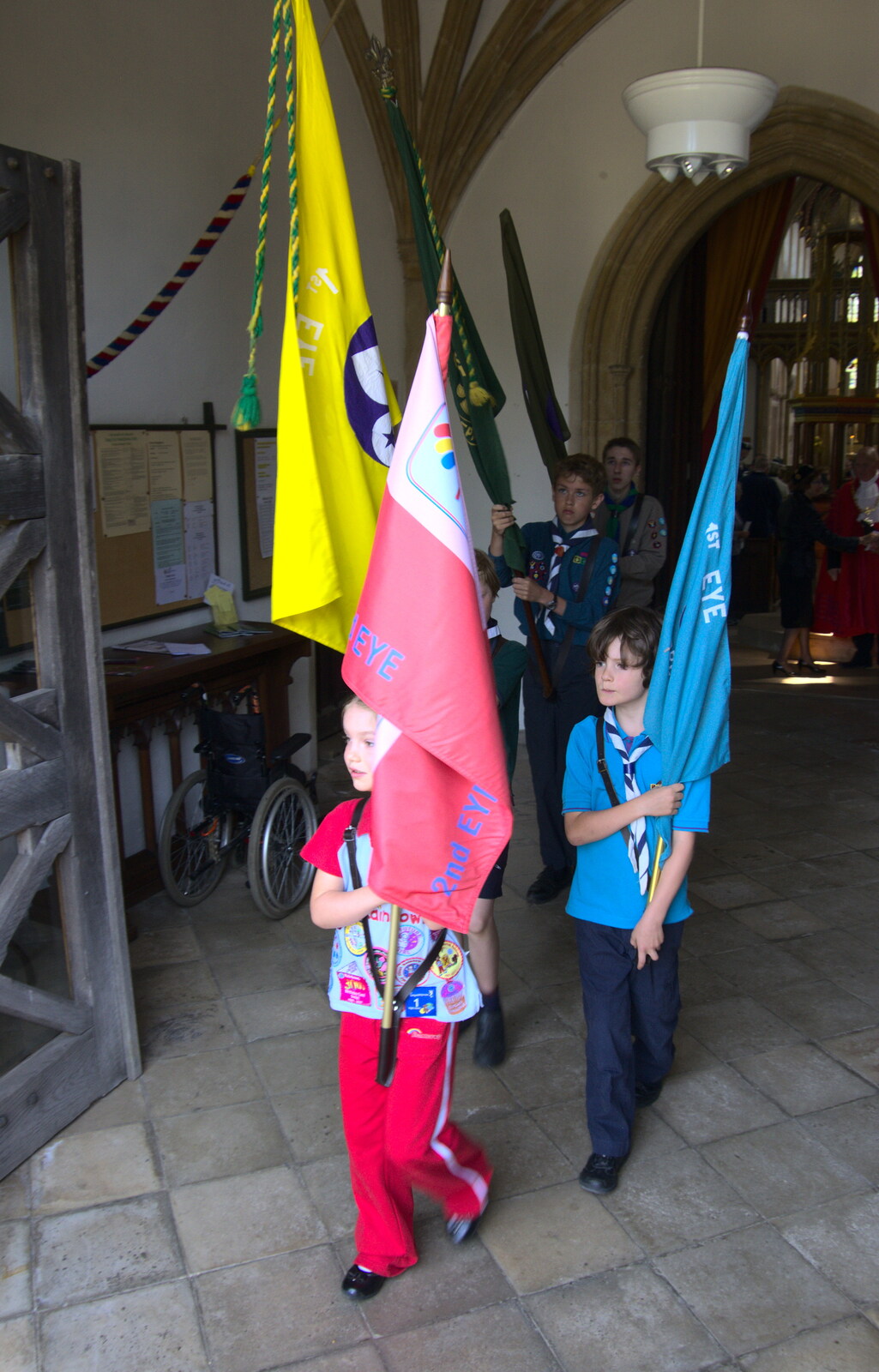 The flag bearers come out after the service from The Mayor Making Parade, Eye, Suffolk - 24th June 2018
