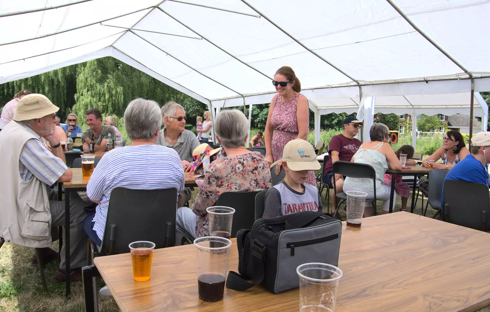 Isobel chats to people, from A Village Hog Roast, Little Green, Thrandeston, Suffolk - 24th June 2018