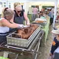 The boys watch as the hog is chopped up, A Village Hog Roast, Little Green, Thrandeston, Suffolk - 24th June 2018