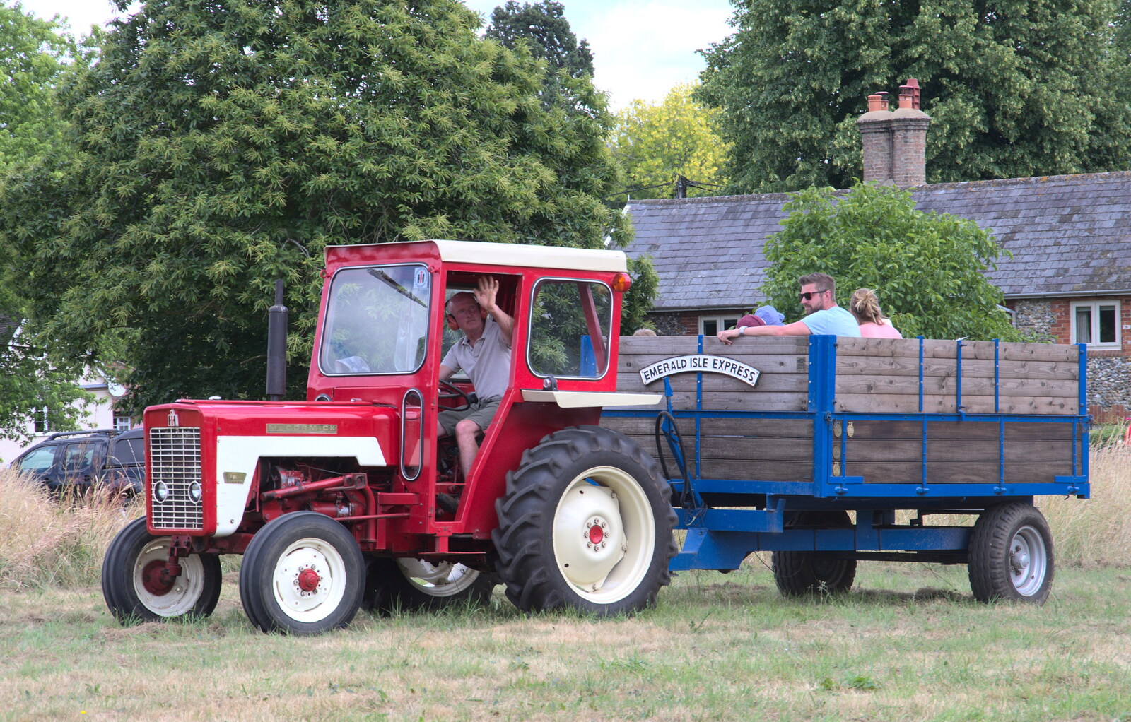 The first of the vintage tractors appears from A Village Hog Roast, Little Green, Thrandeston, Suffolk - 24th June 2018