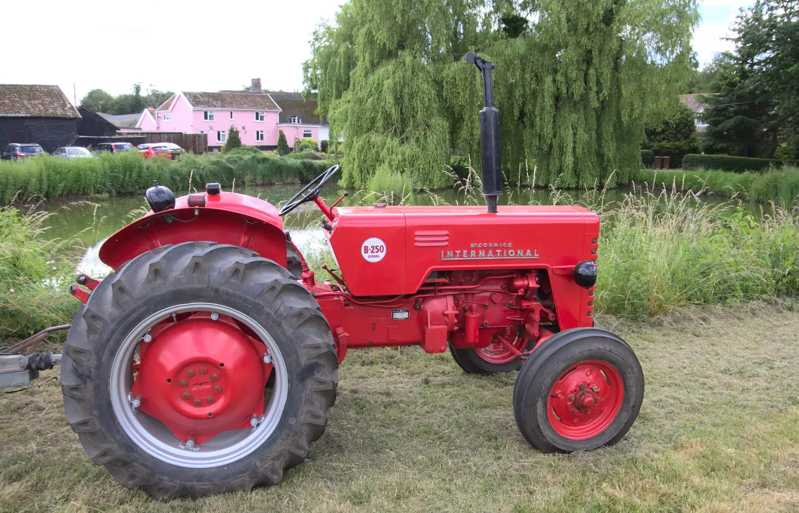 A McCormick International sits by the pond, from A Village Hog Roast, Little Green, Thrandeston, Suffolk - 24th June 2018