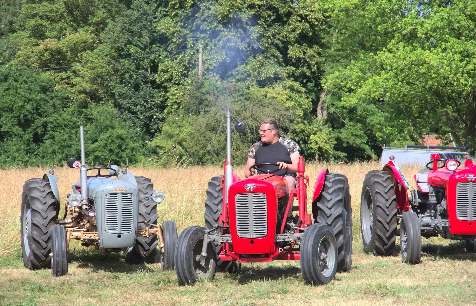 The tractors depart, from A Village Hog Roast, Little Green, Thrandeston, Suffolk - 24th June 2018