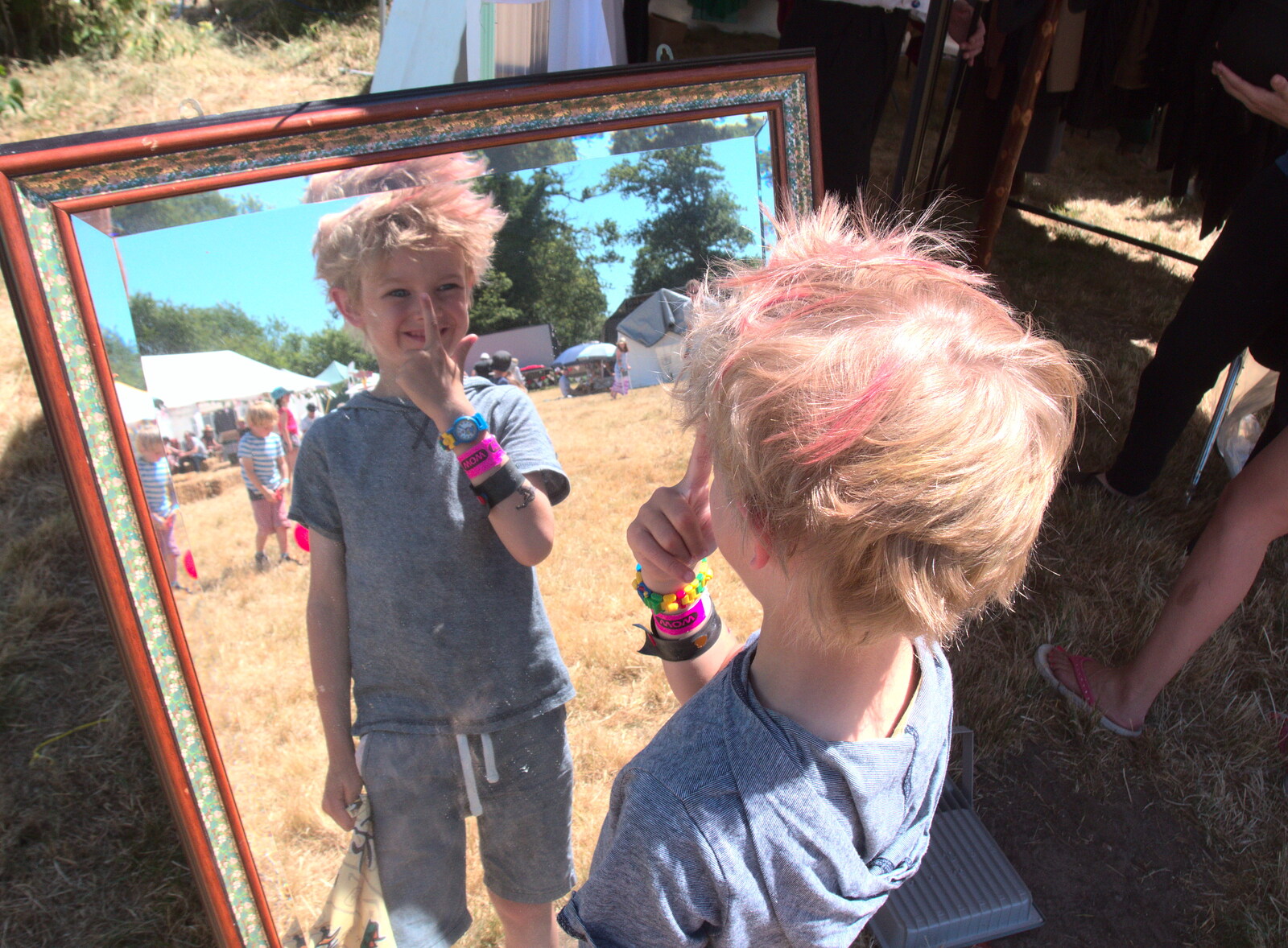 Harry looks in a mirror from WoW Festival, Burston, Norfolk - 29th June - 1st July 2018