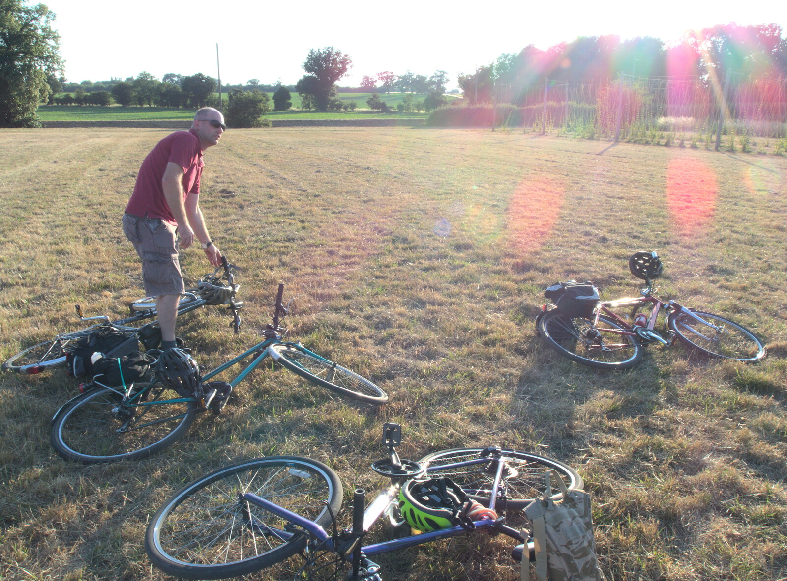 The BSCC Rides to Star Wing Beer Festival, Redgrave, Suffolk - 12th July 2018: Paul drops his bike on the grass
