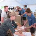 Suey, Marticle and Alan buy some beer vouchers, The BSCC Rides to Star Wing Beer Festival, Redgrave, Suffolk - 12th July 2018