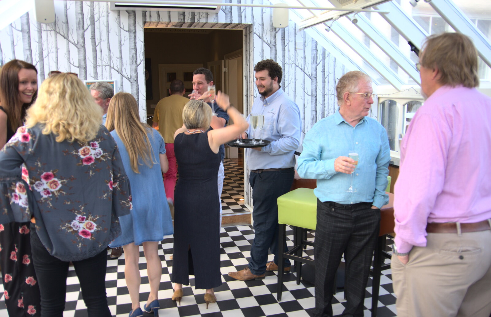 Guests mill around in the conservatory from An Oaksmere Party, Brome, Suffolk - 14th July 2018
