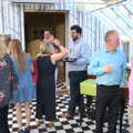 Guests mill around in the conservatory, An Oaksmere Party, Brome, Suffolk - 14th July 2018