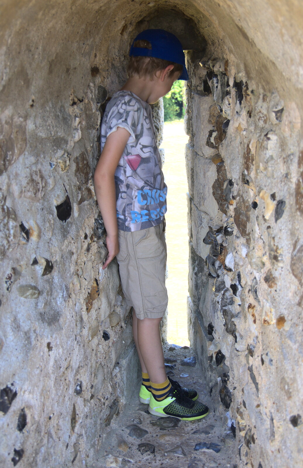 Fred tries to climb out of an arrow slit from A Postcard from the Castle on the Hill, Framlingham, Suffolk - 14th July 2018