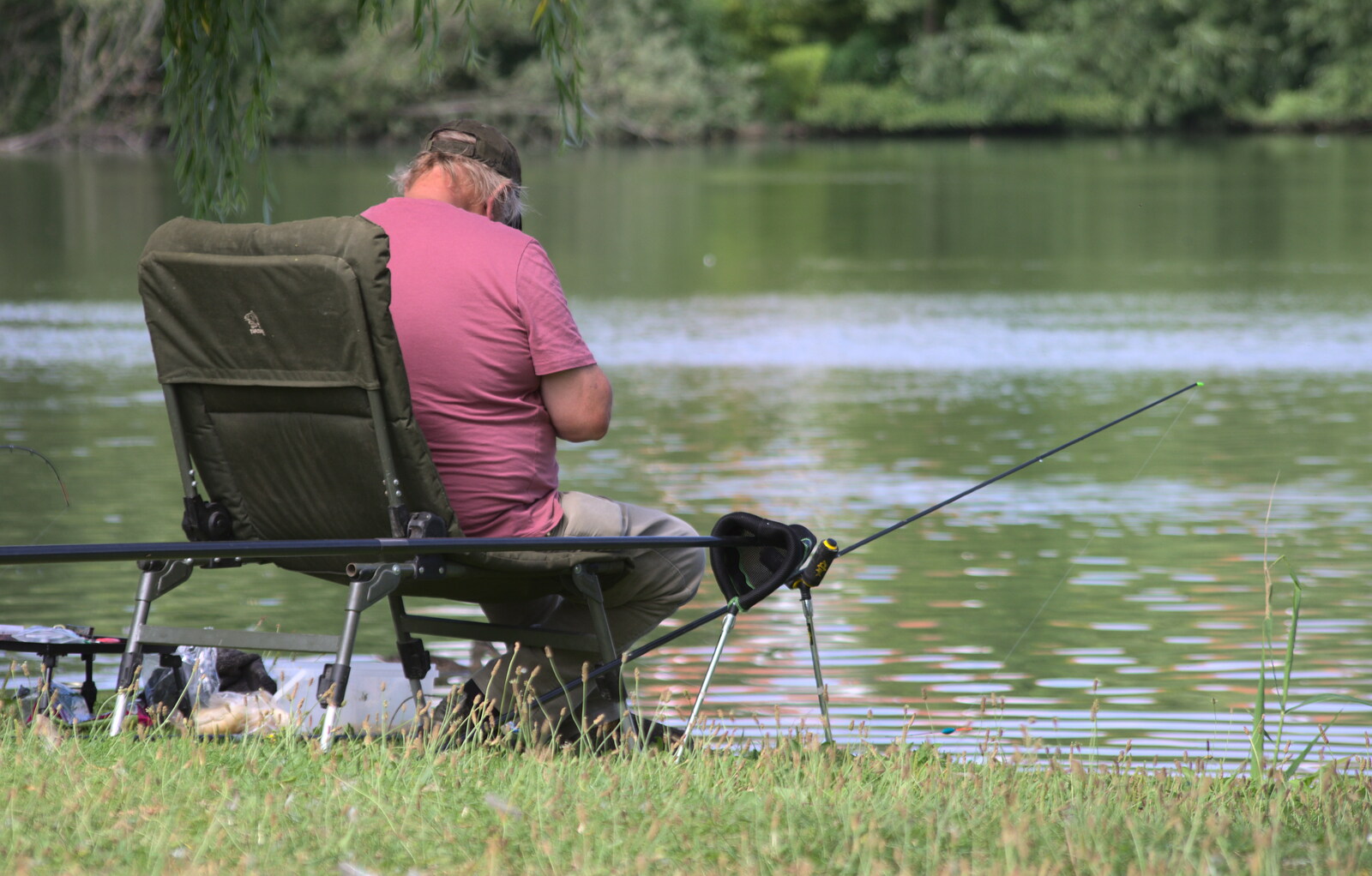 A fisherman takes a nap from Diss Fest, The Park, Diss, Norfolk - 22nd July 2018
