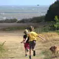 Harry and Fred hurl themselves towards the sea, Blustery Beach Trips, Walkford and Highcliffe, Dorset - 29th July 2018