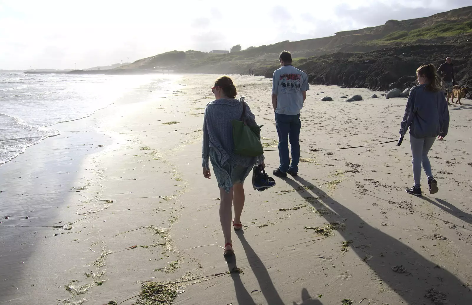 Isobel walks into the sun, from Blustery Beach Trips, Walkford and Highcliffe, Dorset - 29th July 2018