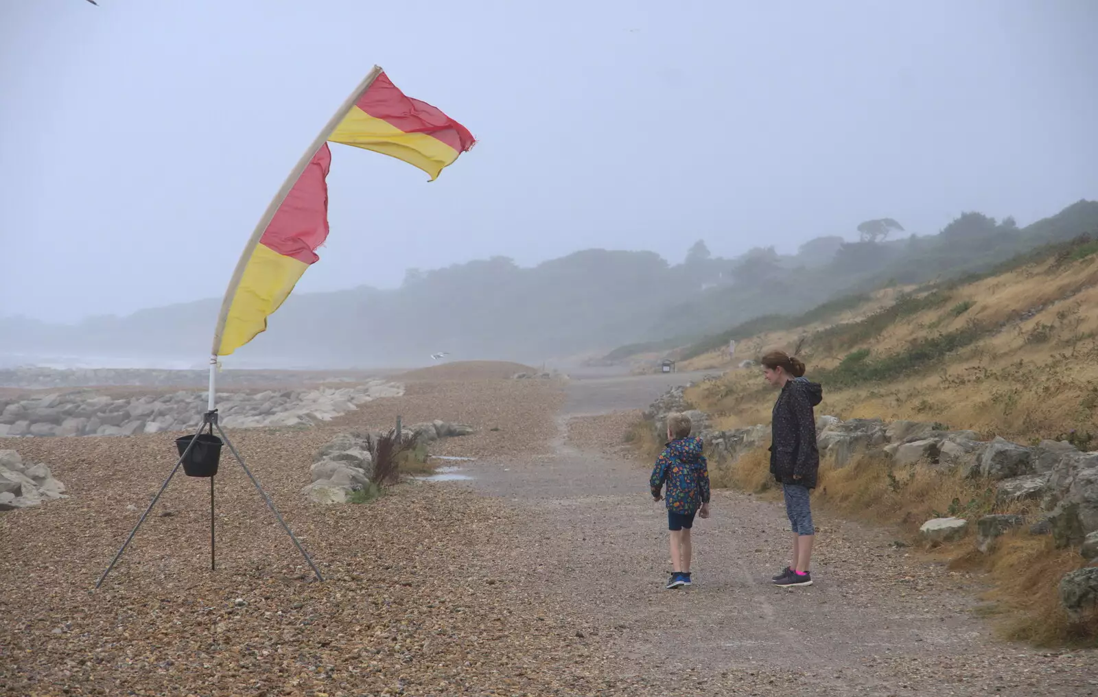 The flag is getting ripped up by the wind, from Blustery Beach Trips, Walkford and Highcliffe, Dorset - 29th July 2018