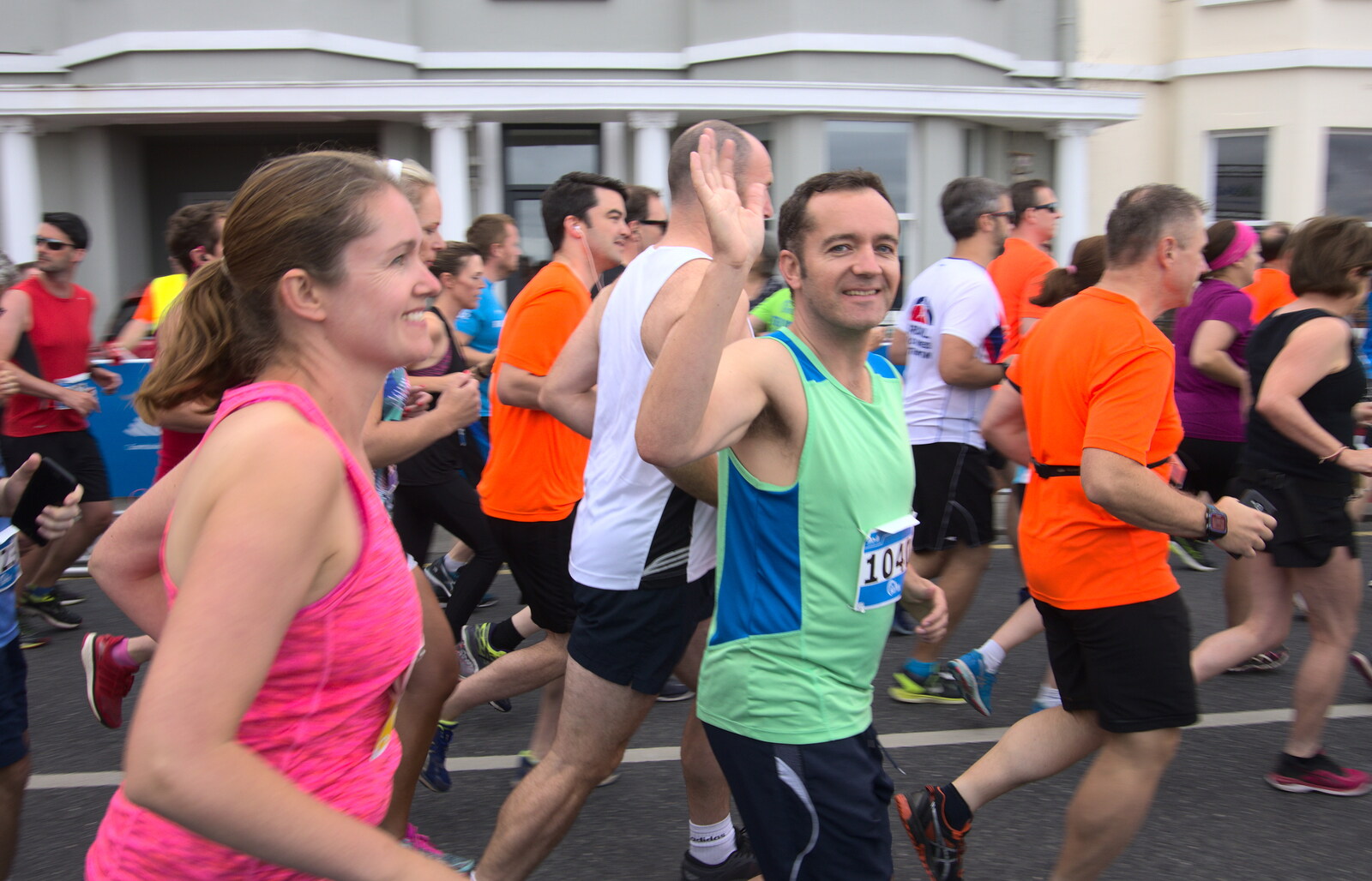 James waves to Fred and Harry as the runners pass by from The Dún Laoghaire 10k Run, County Dublin, Ireland - 6th August 2018