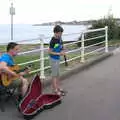 A father/son busking combo, with clarinet, The Dún Laoghaire 10k Run, County Dublin, Ireland - 6th August 2018