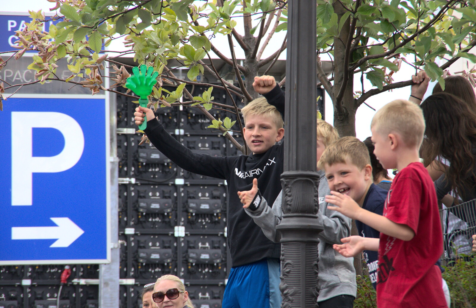 Some kids wave from The Dún Laoghaire 10k Run, County Dublin, Ireland - 6th August 2018