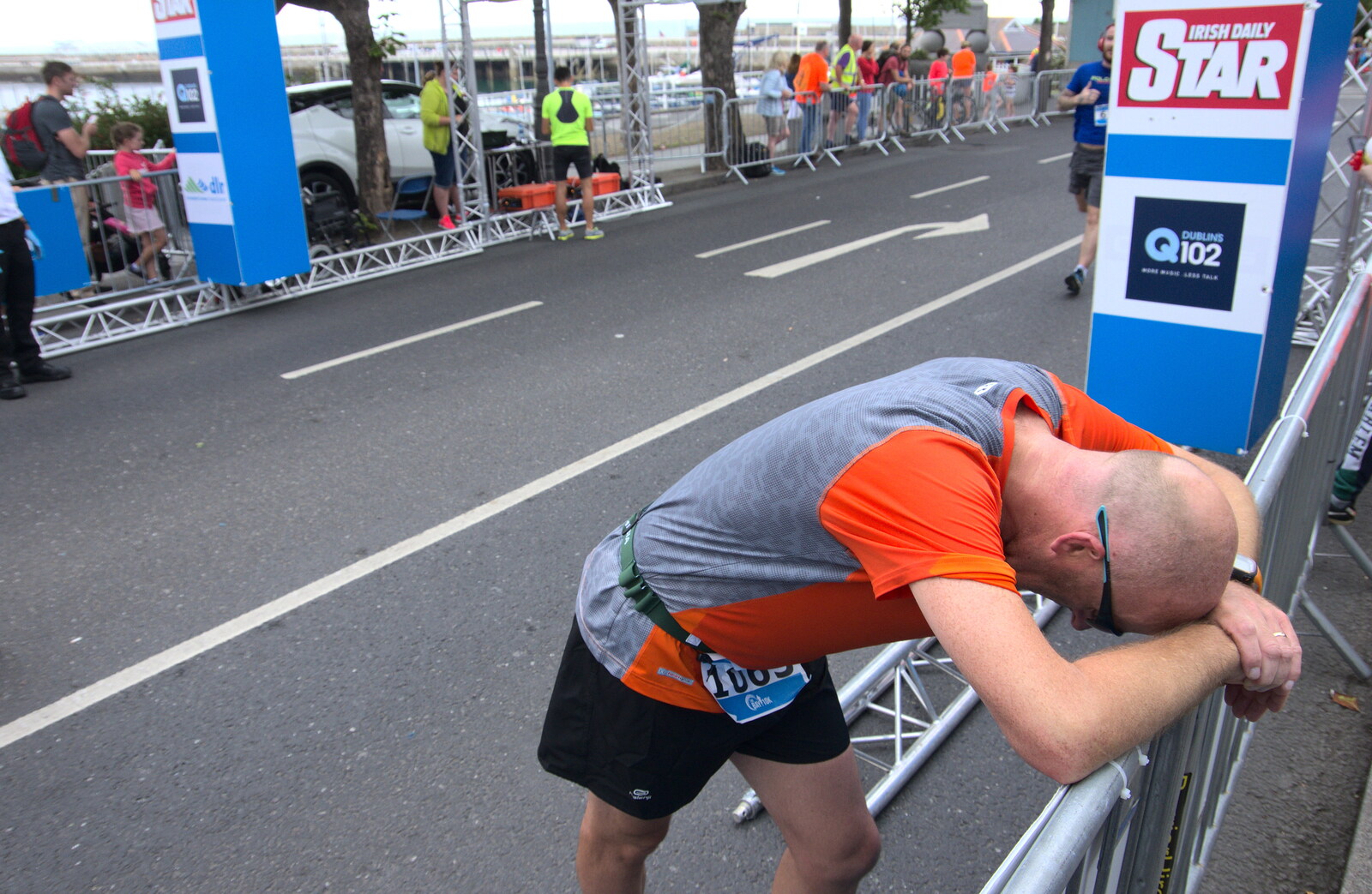 Another exhausted runner from The Dún Laoghaire 10k Run, County Dublin, Ireland - 6th August 2018
