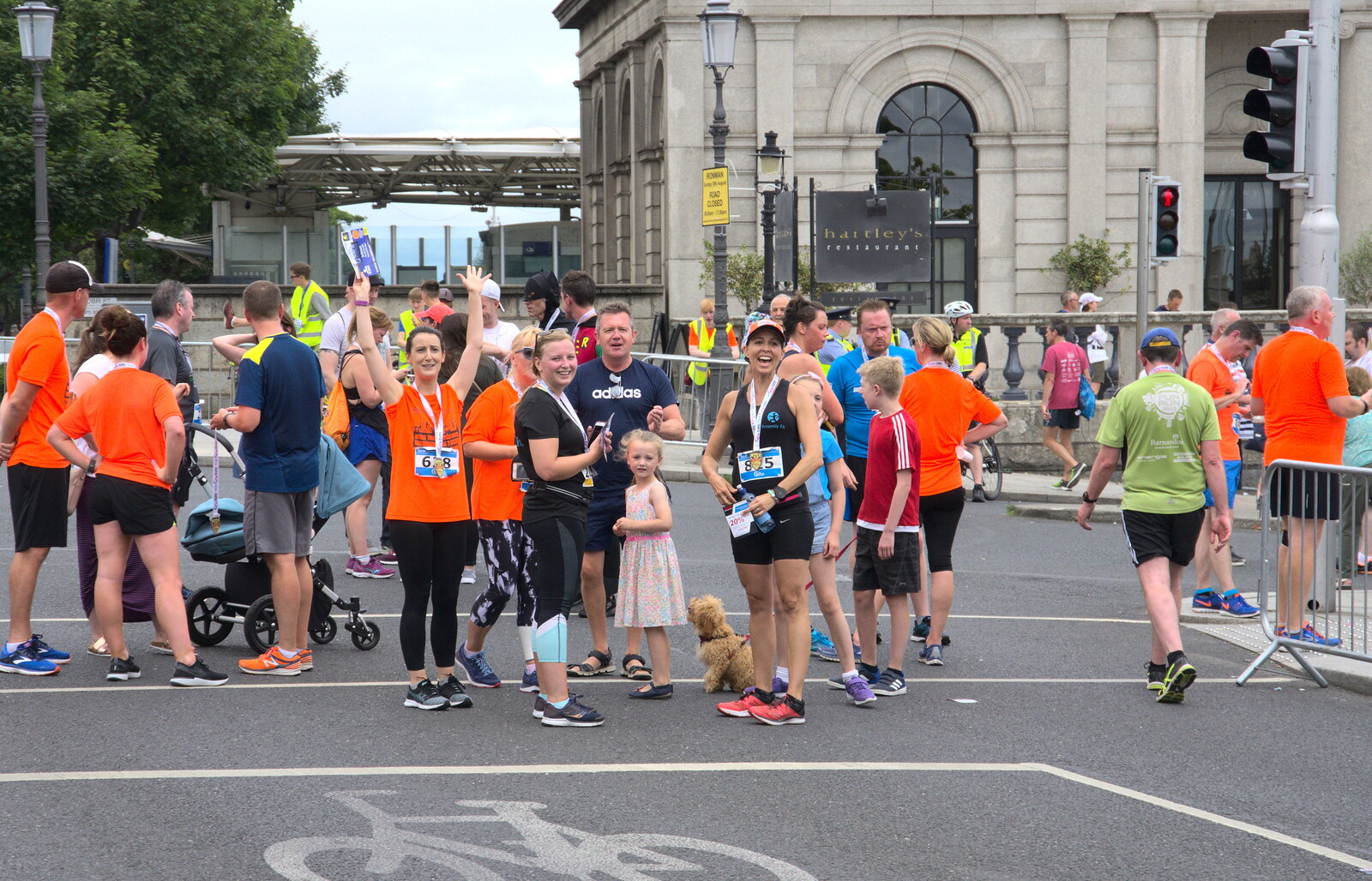 Runner gather near the DART station from The Dún Laoghaire 10k Run, County Dublin, Ireland - 6th August 2018