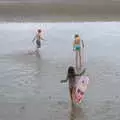 The children run off into the shallows, The Dún Laoghaire 10k Run, County Dublin, Ireland - 6th August 2018