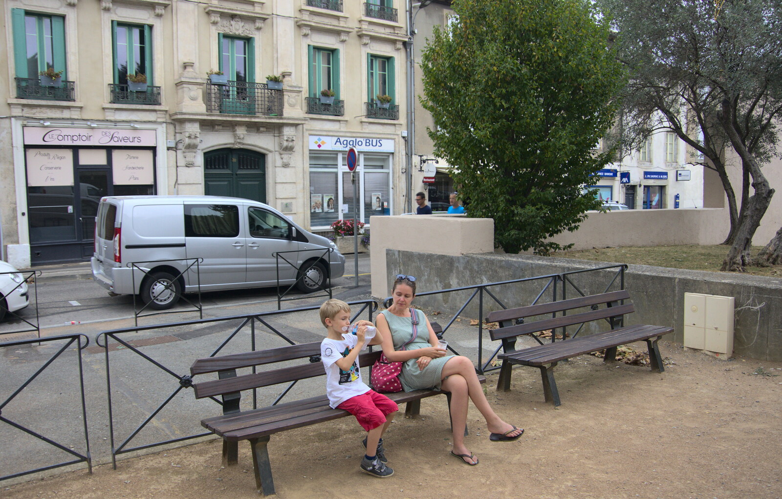 Harry and Isobel wait outside from A Trip to Carcassonne, Aude, France - 8th August 2018