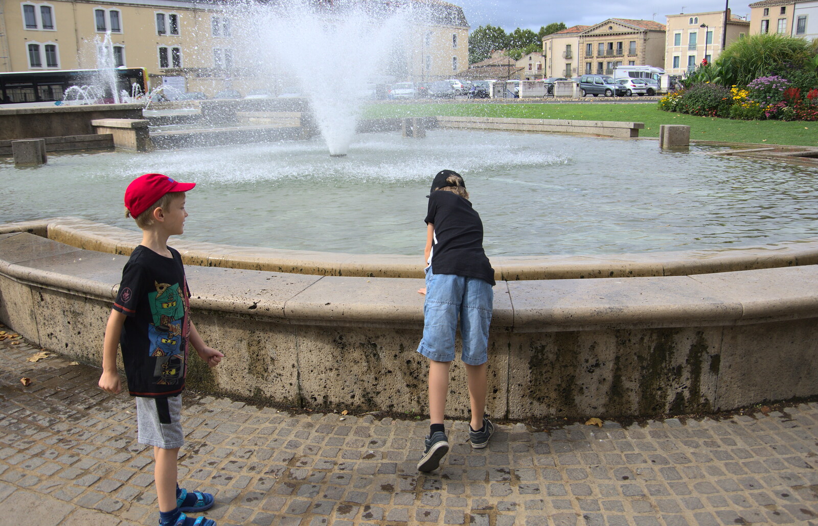 The boys play in a fountain from Abbaye Sainte-Marie de Lagrasse and The Lac de la Cavayère, Aude, France - 10th August