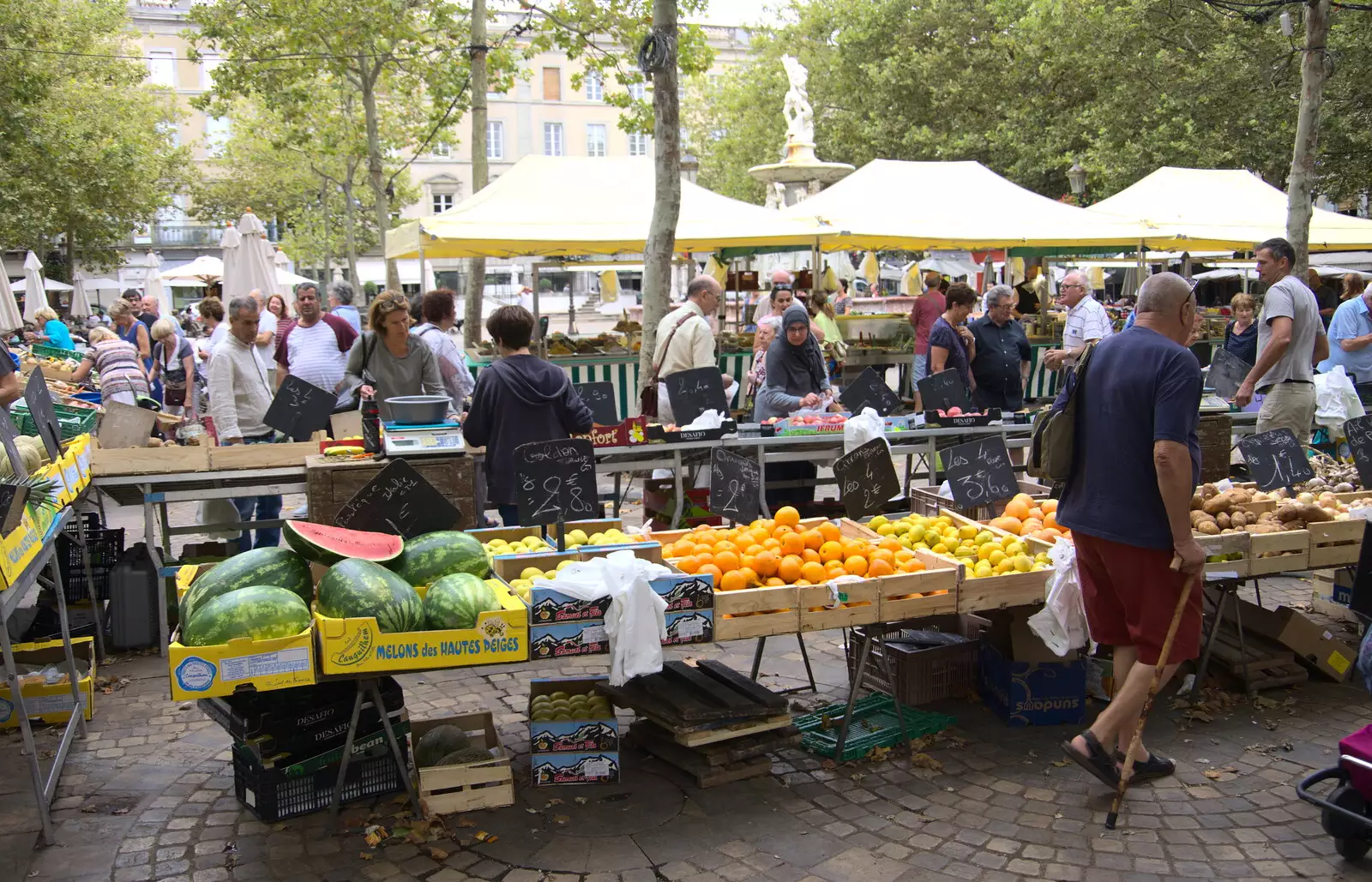 The markets of Carcassonne, in Place Carnot, from Abbaye Sainte-Marie de Lagrasse and The Lac de la Cavayère, Aude, France - 10th August