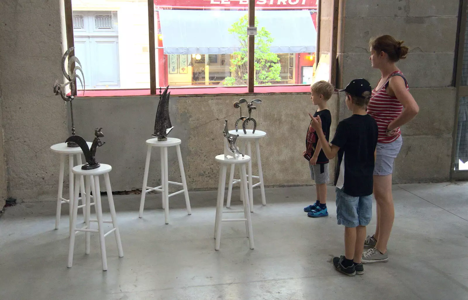 The gang inspects some sculptures in an exhibition, from Abbaye Sainte-Marie de Lagrasse and The Lac de la Cavayère, Aude, France - 10th August