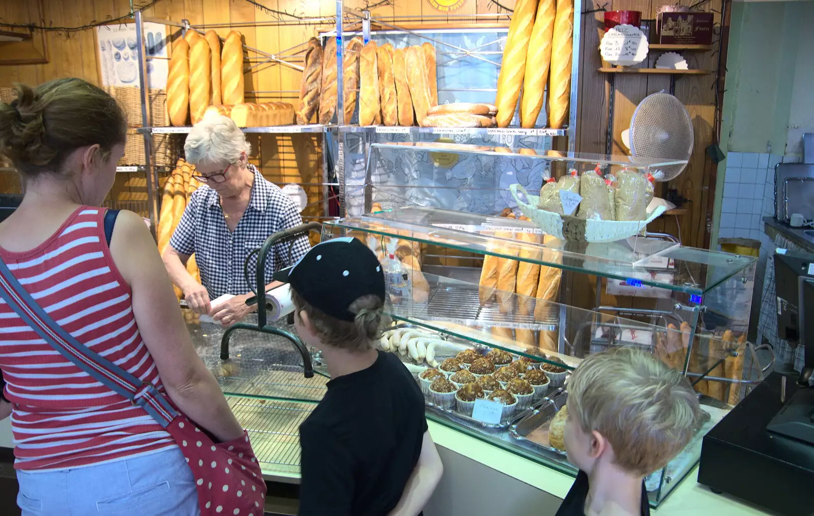 Isobel buys some stuff in a boulangerie, from Abbaye Sainte-Marie de Lagrasse and The Lac de la Cavayère, Aude, France - 10th August