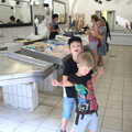 Fred and Harry mess around in a fish shop, Abbaye Sainte-Marie de Lagrasse and The Lac de la Cavayère, Aude, France - 10th August