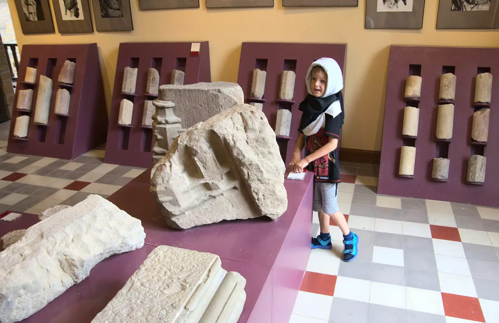 Harry looks at some stones, from Abbaye Sainte-Marie de Lagrasse and The Lac de la Cavayère, Aude, France - 10th August