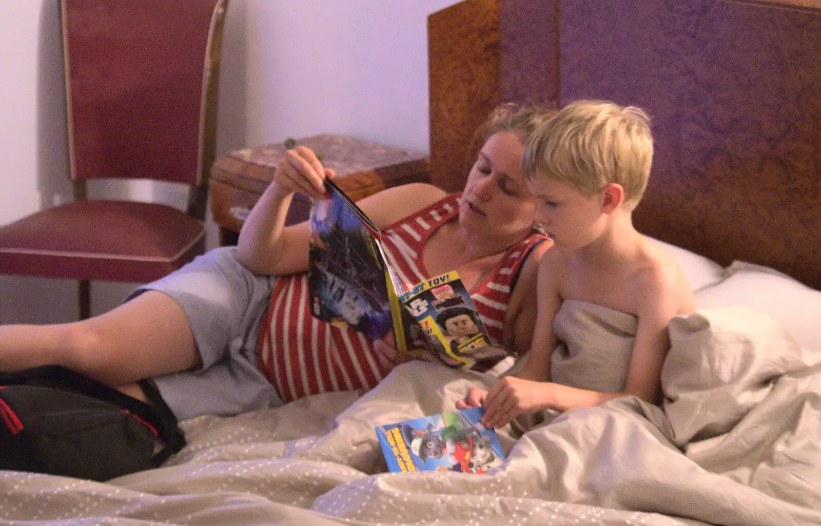 Isobel reads a magazine as a bedtime story, from Abbaye Sainte-Marie de Lagrasse and The Lac de la Cavayère, Aude, France - 10th August