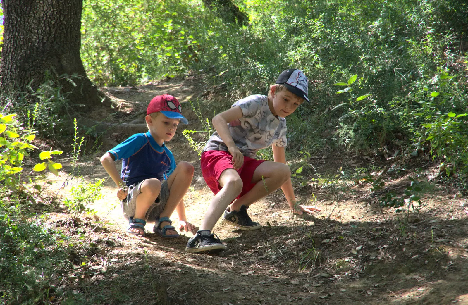 Harry and Fred scramble down a hillside, from Abbaye Sainte-Marie de Lagrasse and The Lac de la Cavayère, Aude, France - 10th August