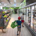 Isobel roams around with a cucumber in Carrefour , Abbaye Sainte-Marie de Lagrasse and The Lac de la Cavayère, Aude, France - 10th August
