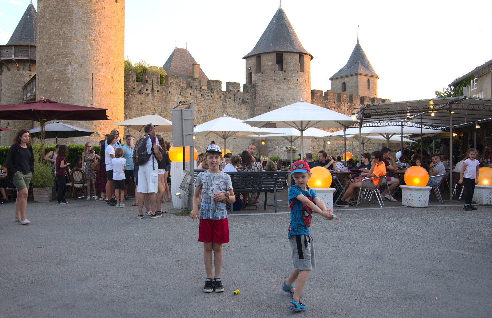 The boys in the square from Abbaye Sainte-Marie de Lagrasse and The Lac de la Cavayère, Aude, France - 10th August