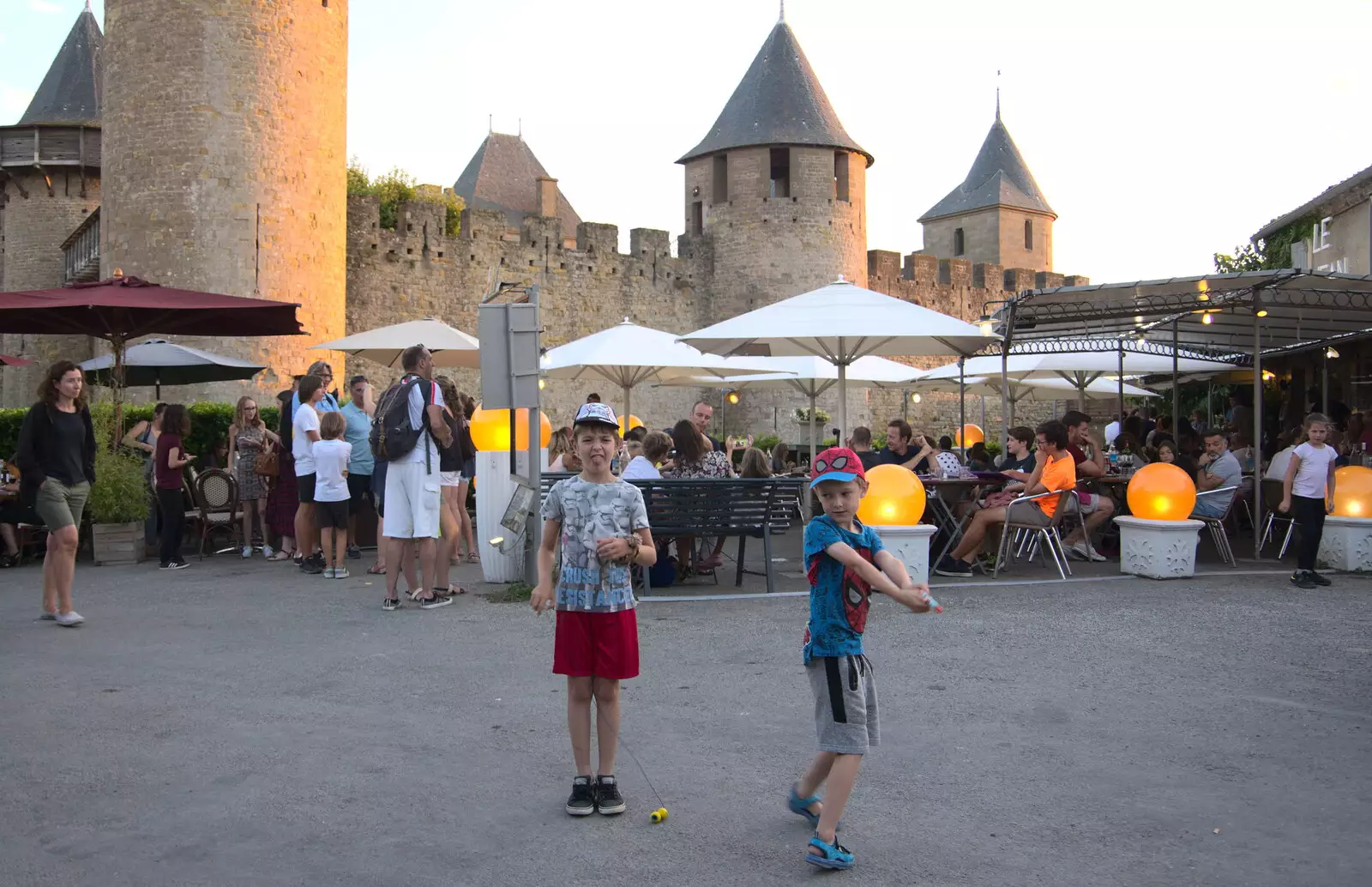 The boys in the square, from Abbaye Sainte-Marie de Lagrasse and The Lac de la Cavayère, Aude, France - 10th August