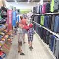 Isobel looks for luggage in Casino hypermarché, The Château Comtal, Lastours and the Journey Home, Carcassonne, Aude, France - 14th August 2018