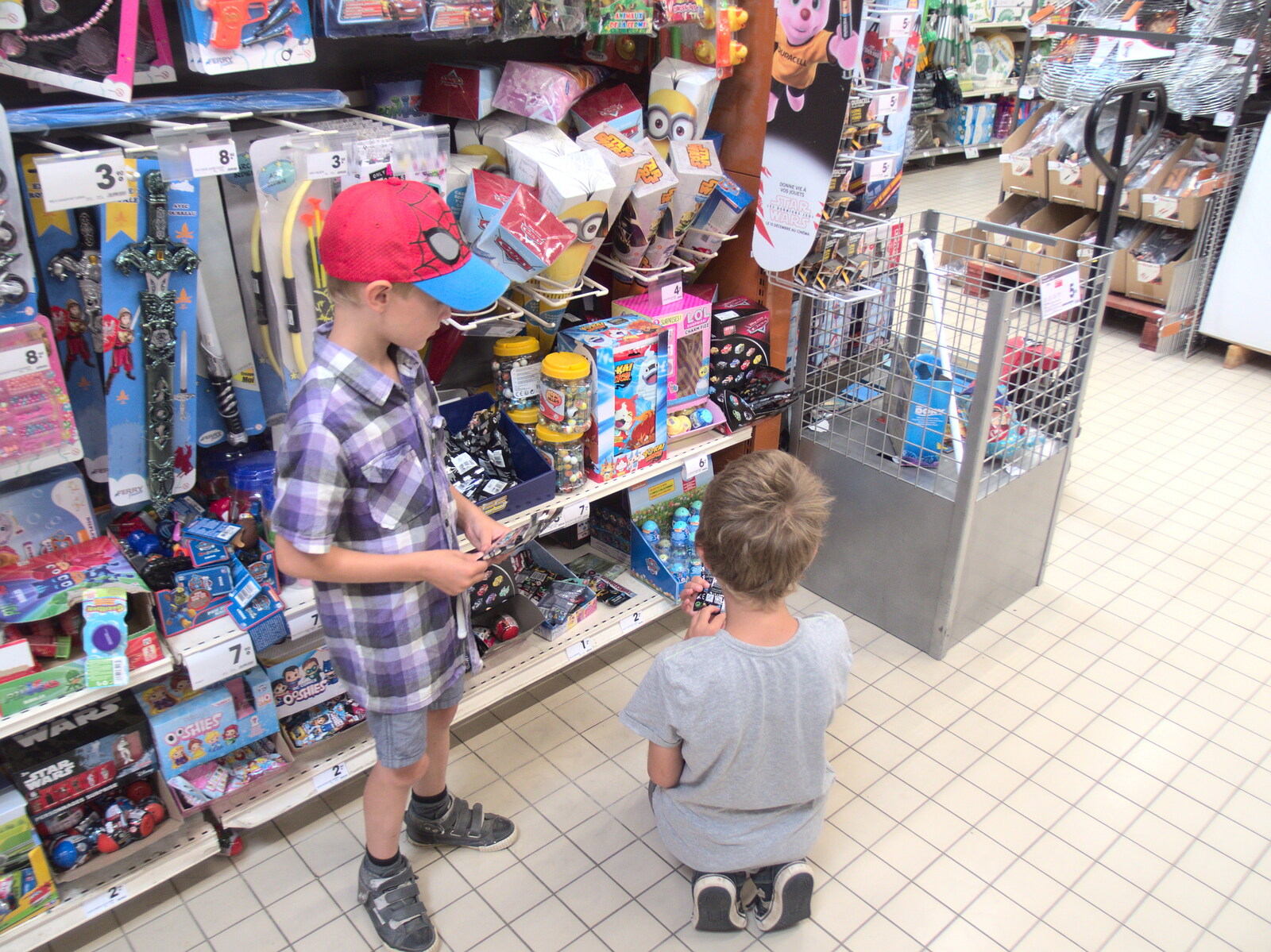 The boys look for toys to buy from The Château Comtal, Lastours and the Journey Home, Carcassonne, Aude, France - 14th August 2018