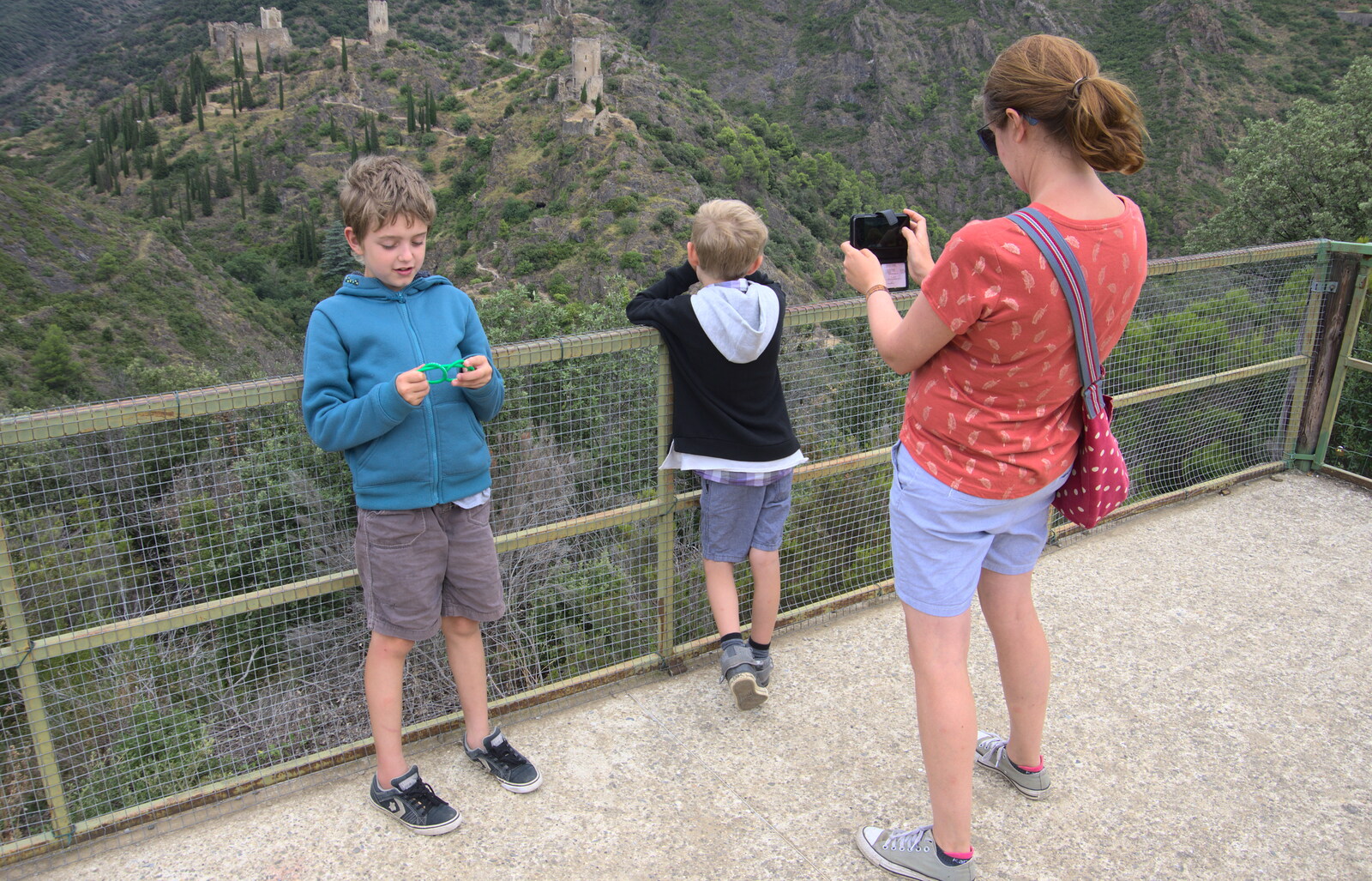 Isobel takes a photo from The Château Comtal, Lastours and the Journey Home, Carcassonne, Aude, France - 14th August 2018