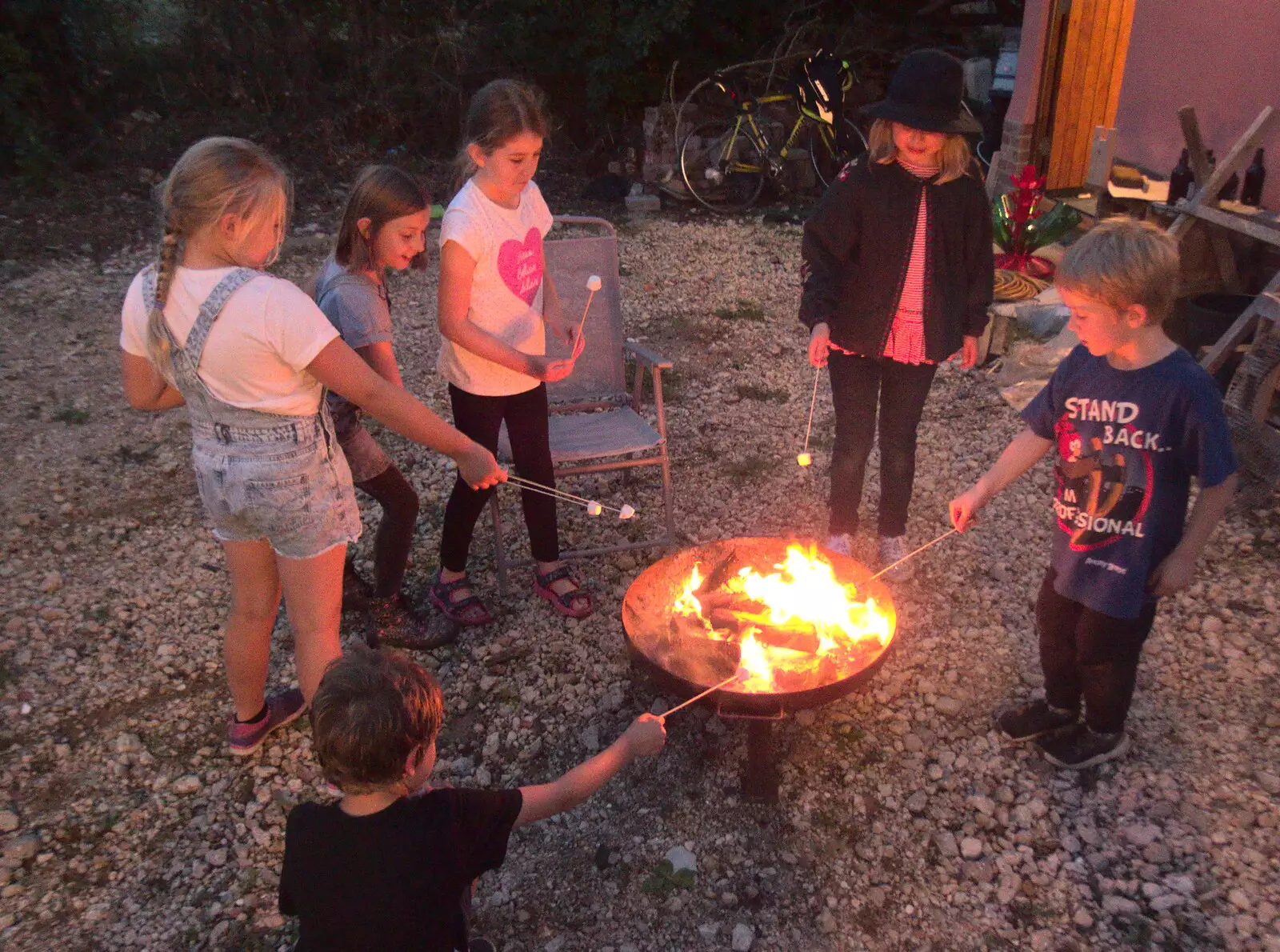 The children do marshmallows in the fire pit, from A Summer Party, Brome, Suffolk - 18th August 2018