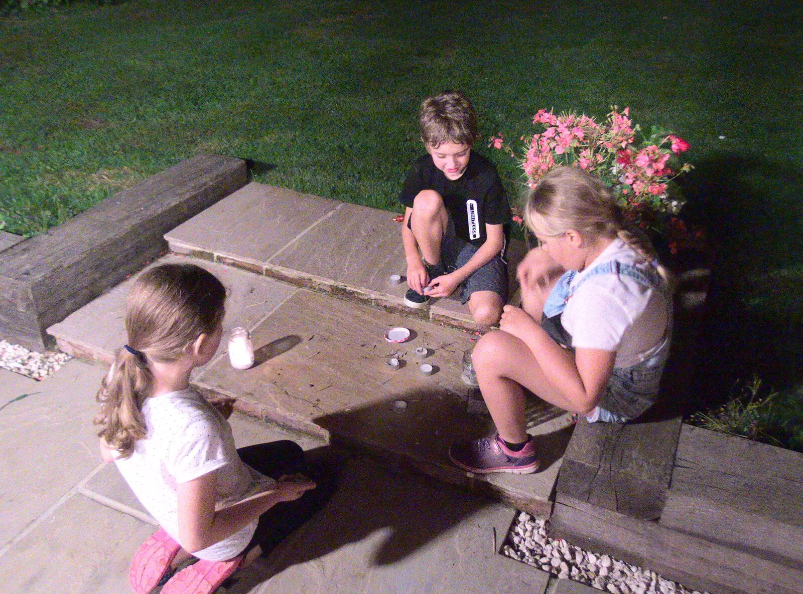 Fred and the gang mess around with tea lights, from A Summer Party, Brome, Suffolk - 18th August 2018