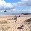 Fred watches the kite whirl around above him, A Day on the Beach, Southwold, Suffolk - 25th August 2018