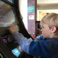 Harry is mesmerised by the fruit machine in the pub, A Postcard from Stratford-upon-Avon, Warwickshire - 9th September 2018