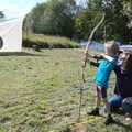 Harry flings a few arrows too, Gislingham Silver Band and the Duck Race, The Pennings, Eye, Suffolk - 29th September 2018