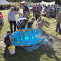 Gislingham Silver Band and the Duck Race, The Pennings, Eye, Suffolk - 29th September 2018, A paddling pool is tipped out