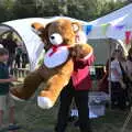 Adrian - the band leader - gets a giant teddy bear, Gislingham Silver Band and the Duck Race, The Pennings, Eye, Suffolk - 29th September 2018