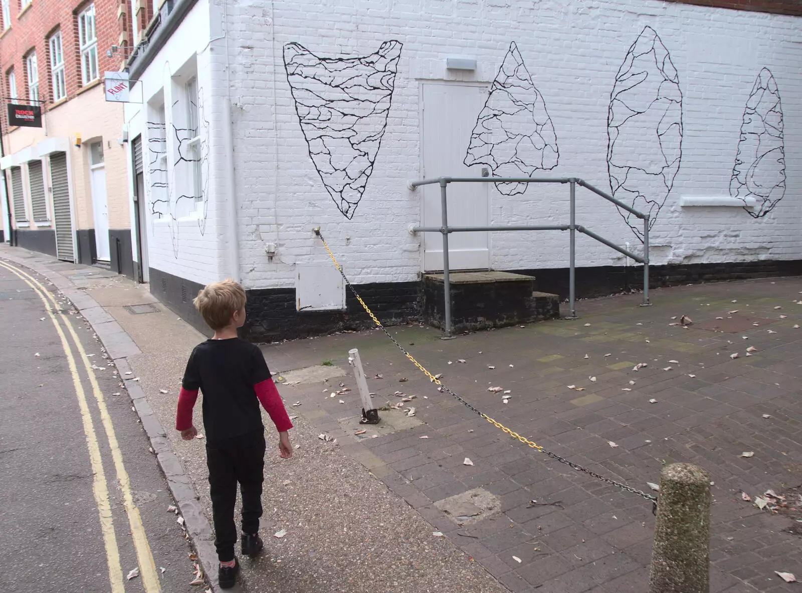 Harry walks past a shop called Flint, from A Miscellany, Norwich , Norfolk - 30th September 2018