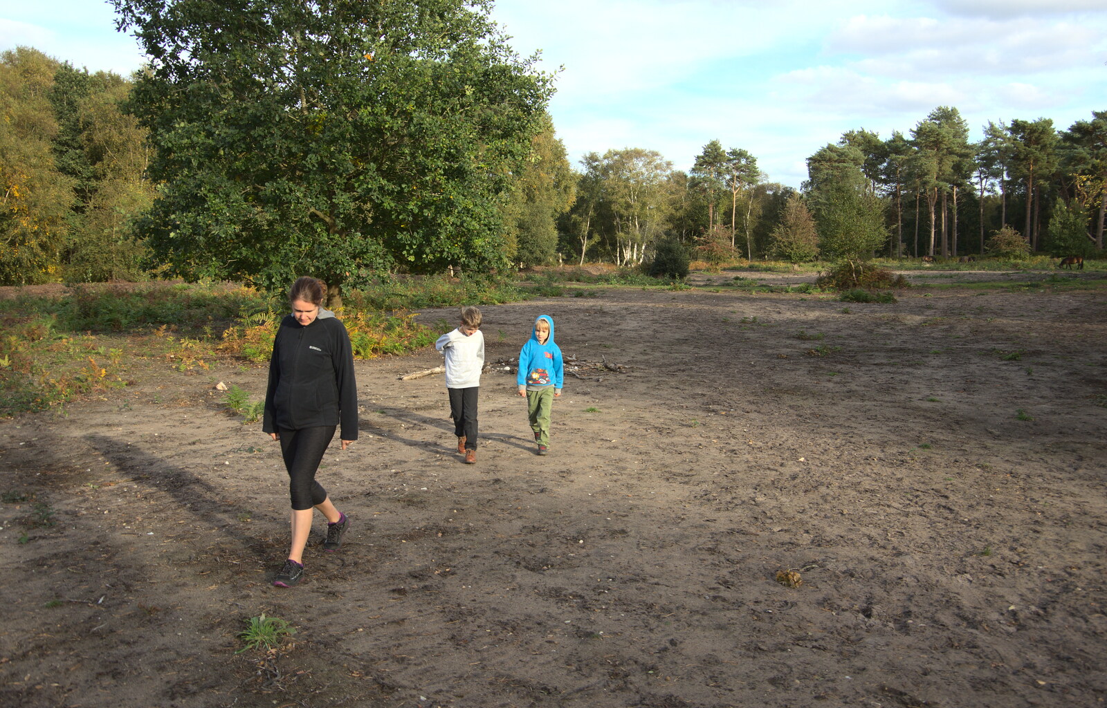 The gang roam around a patch of newly-cleared land from Evidence of Autumn: Geocaching on Knettishall Heath, Suffolk - 7th October 2018