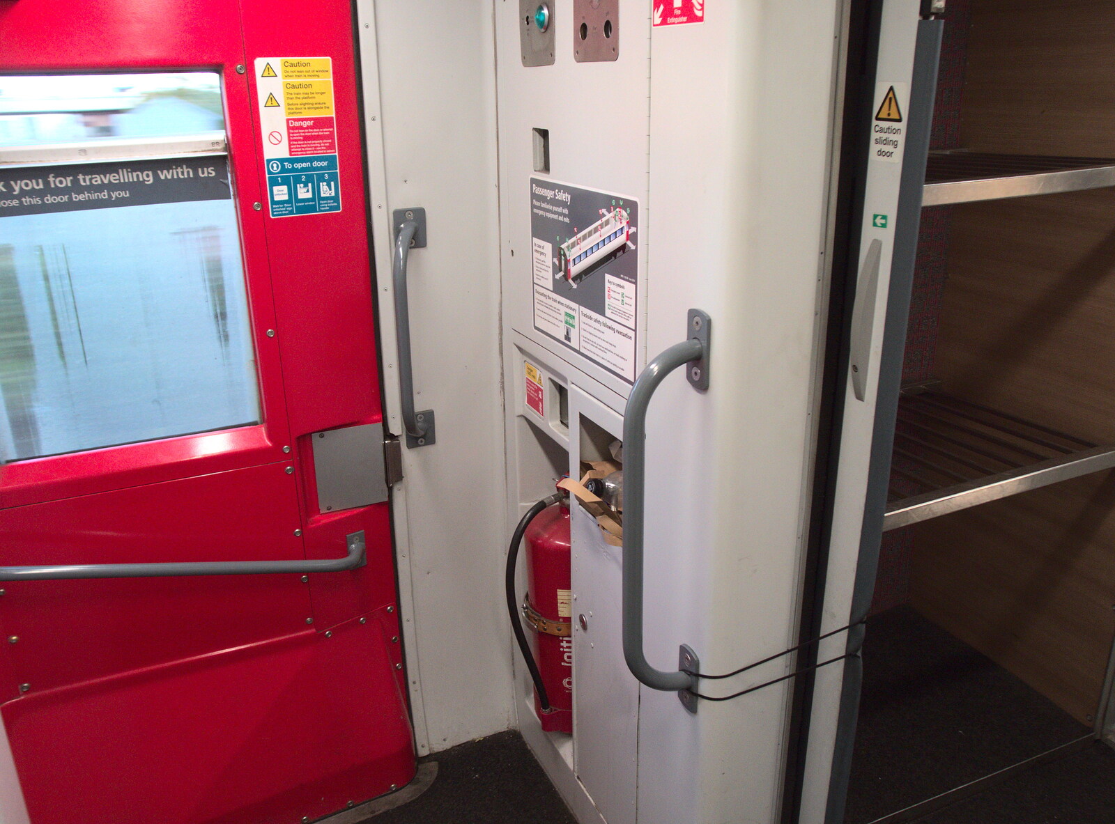 Greater Anglia does quality repairs on a door from Harry's Investiture and Lachie Leaves, Suffolk and London - 17th October 2018