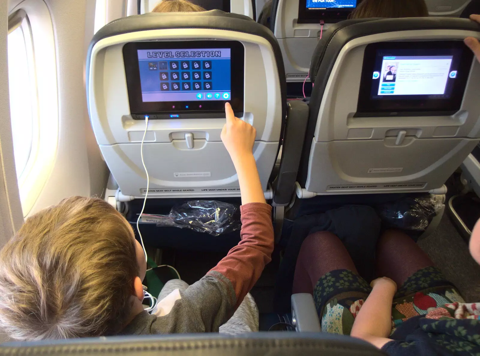 The boys are excited with in-seat entertainment, from A Trip to Short Hills, New Jersey, United States - 20th October 2018