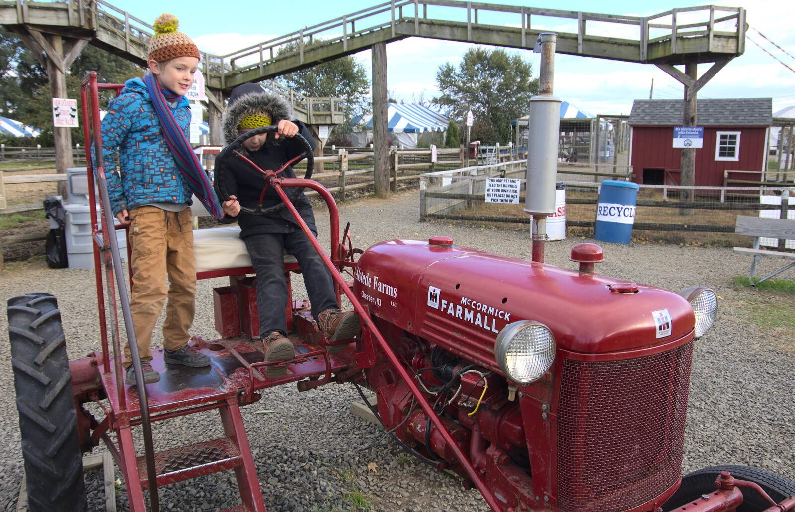 The boys mess around on an old McCormick Farmall  from Pumpkin Picking at Alstede Farm, Chester, Morris County, New Jersey - 24th October 2018